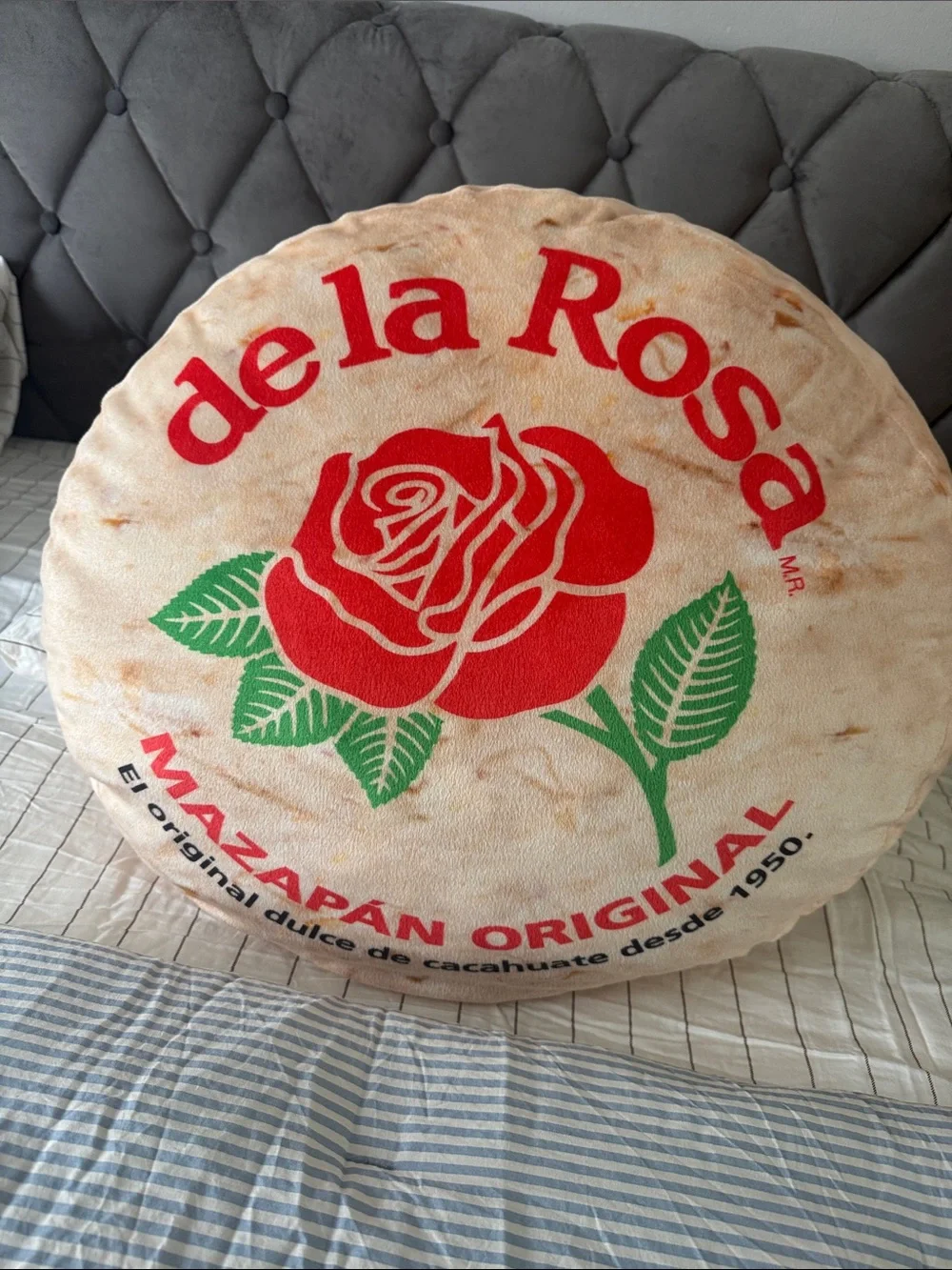 de la Rosa Round Logo Pillow - Red Rose Print